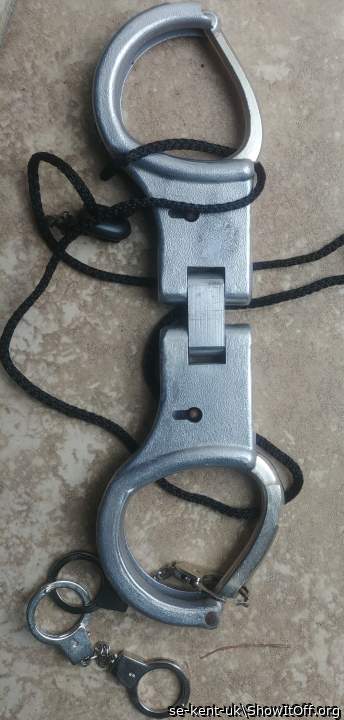 Some of my old BDSM gear, French handcuffs (smooth inner edge)