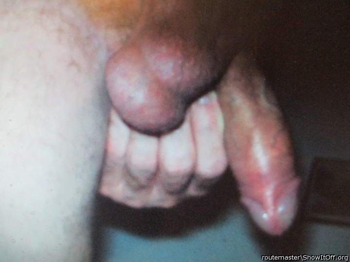 John's dick and balls from behind, during one of his earlier visits