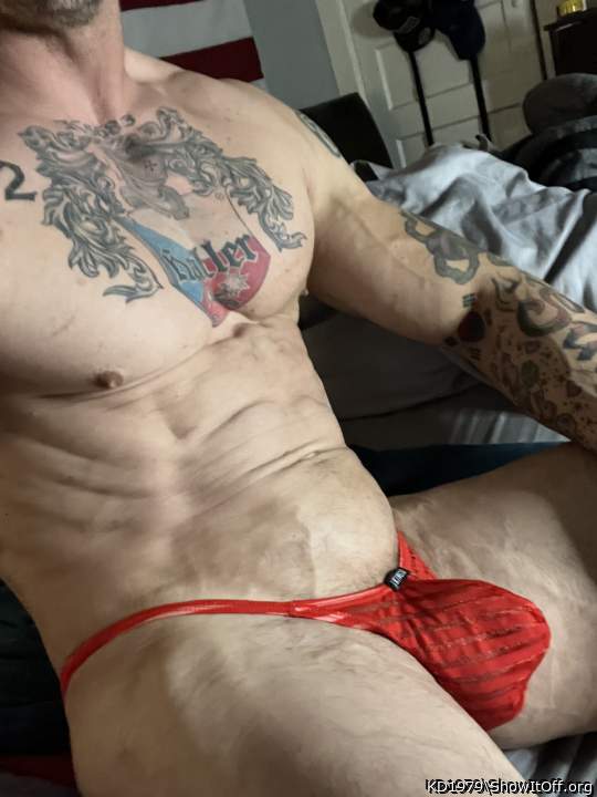Red thongs and muscles