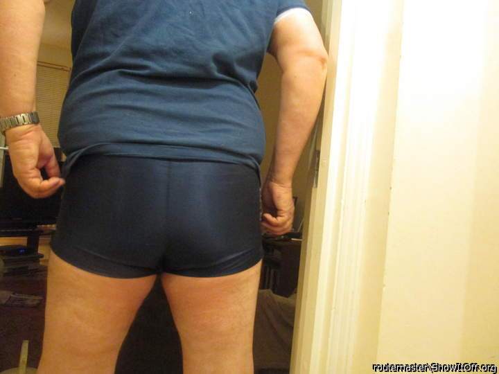 My bum accentuated by tight skimpy blue football shorts