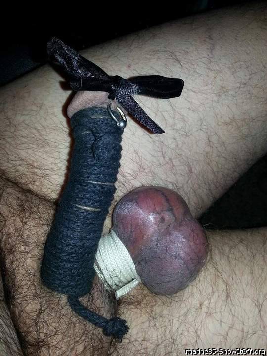Tied cock and balls