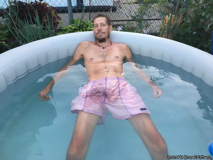 Jim in the Hot Tub in shorts