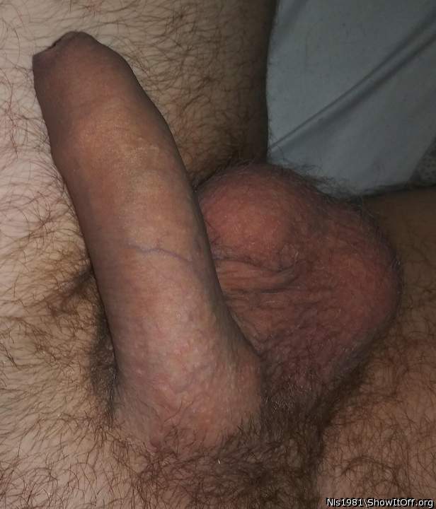 Soft floppy cock and loose cum filled balls.