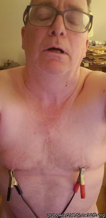 Donny painfully clamps his nips.