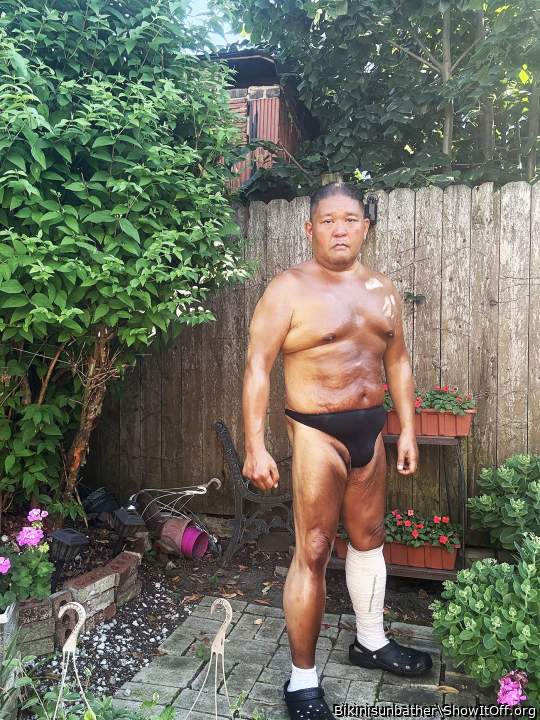 Black thong sunbathing in my backyard