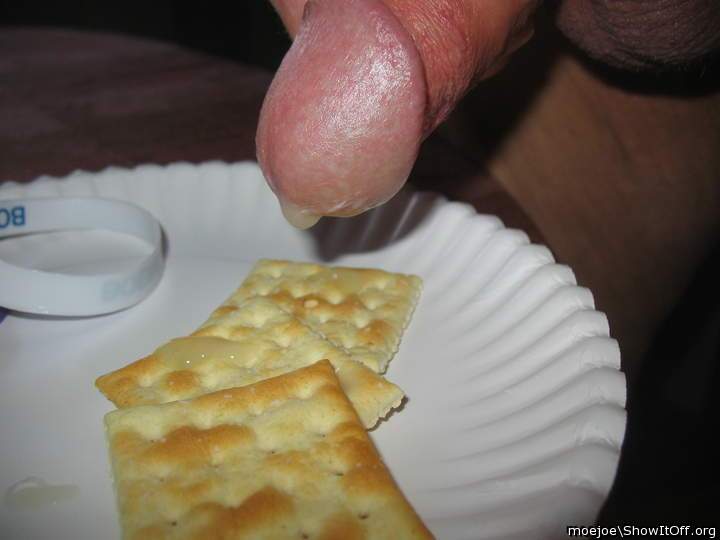Putting some jam on the crackers........