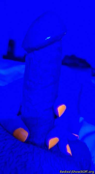 Neon nail polish in blue light