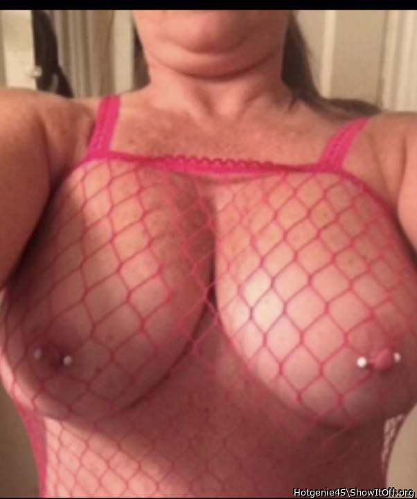 Vote in photo contest.  Huge boobs & nipples in fishnet.