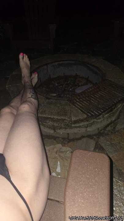 Naked by the fire pit