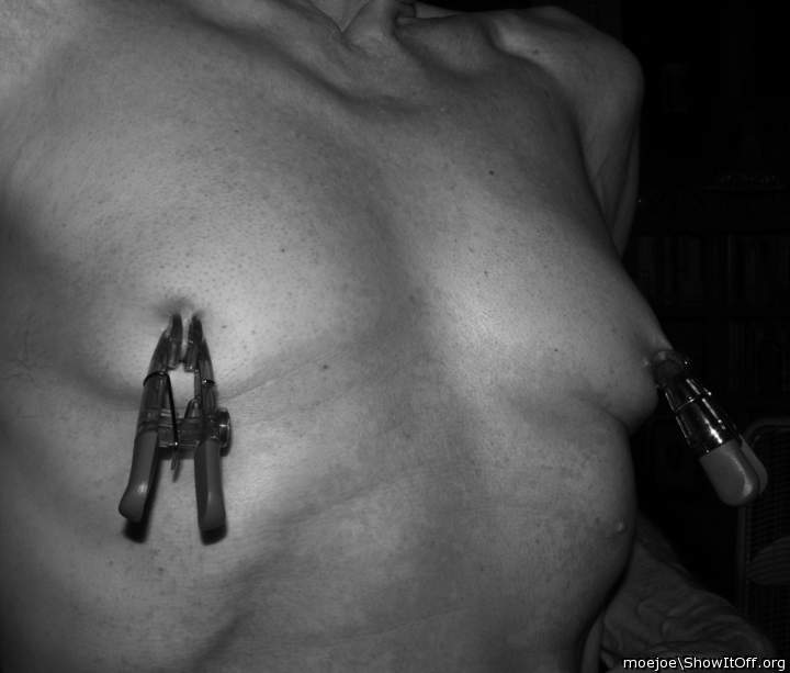 Clamped tit nipples.....