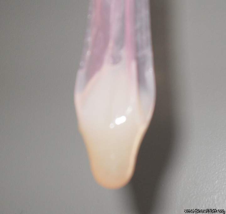 my cumload in a pink condom