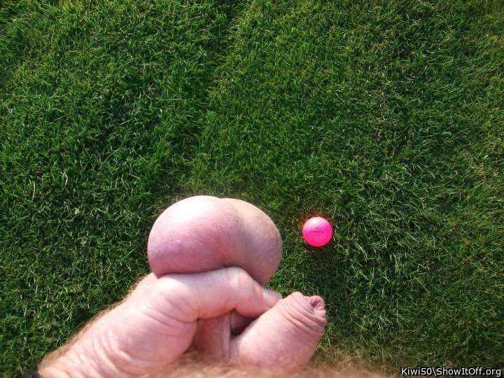 A golf ball with my balls out in the sun.