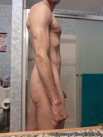Fit smooth sexy body.   The tip of your cock visible makes t