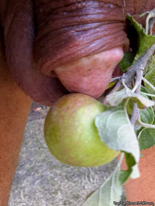 Gardening outdoors naked