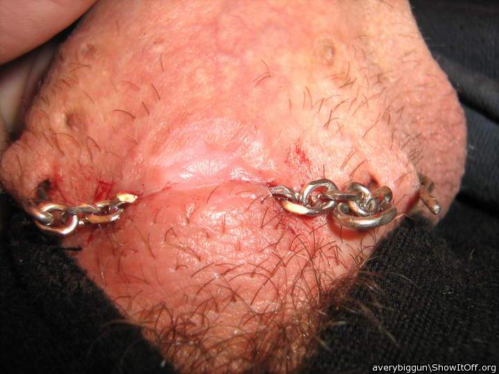 Chain thru piercing