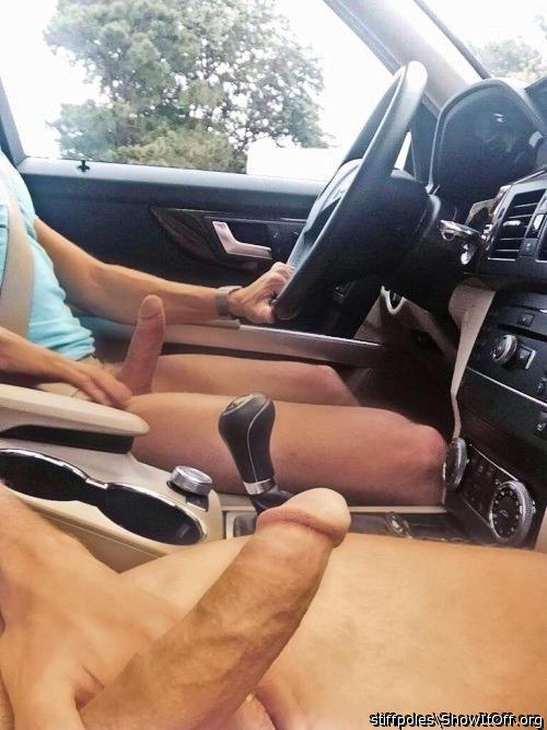 My buddy driving while we wank together