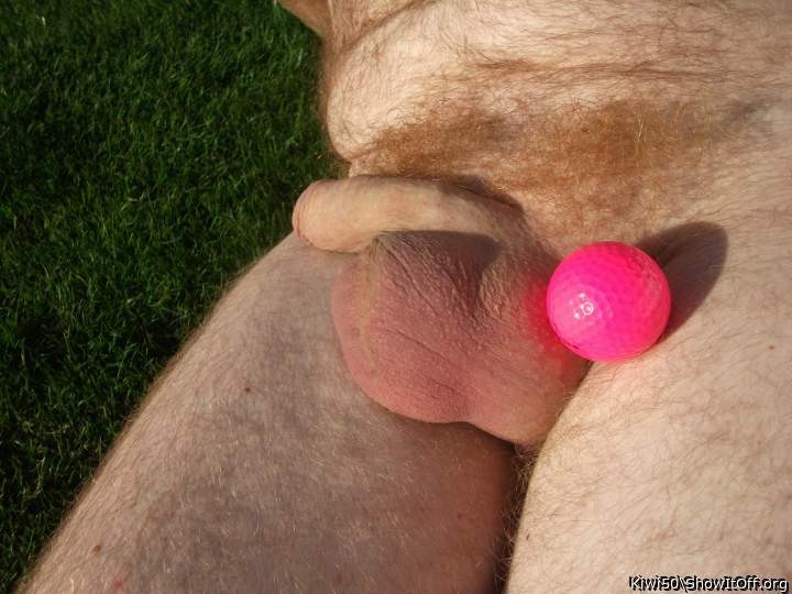 A golf ball with my balls out in the sun.