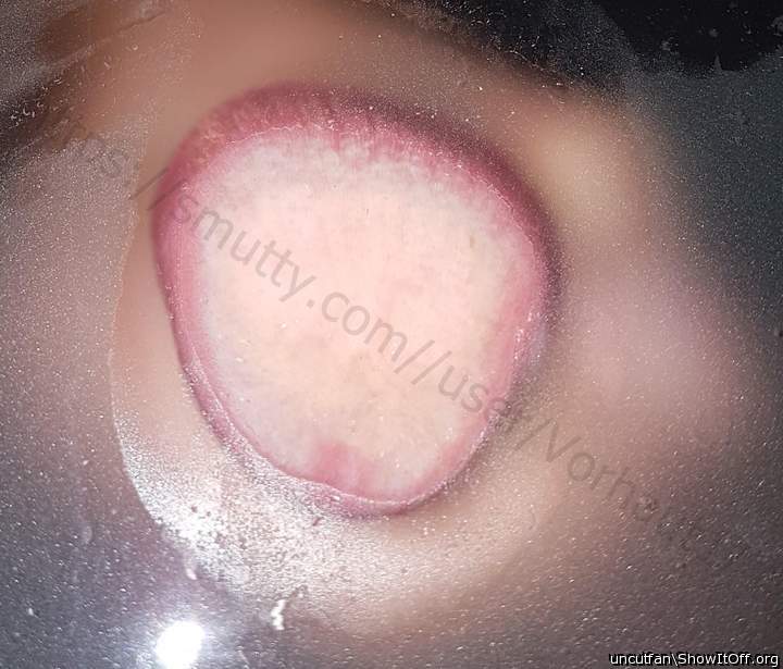 glans pushed against glas