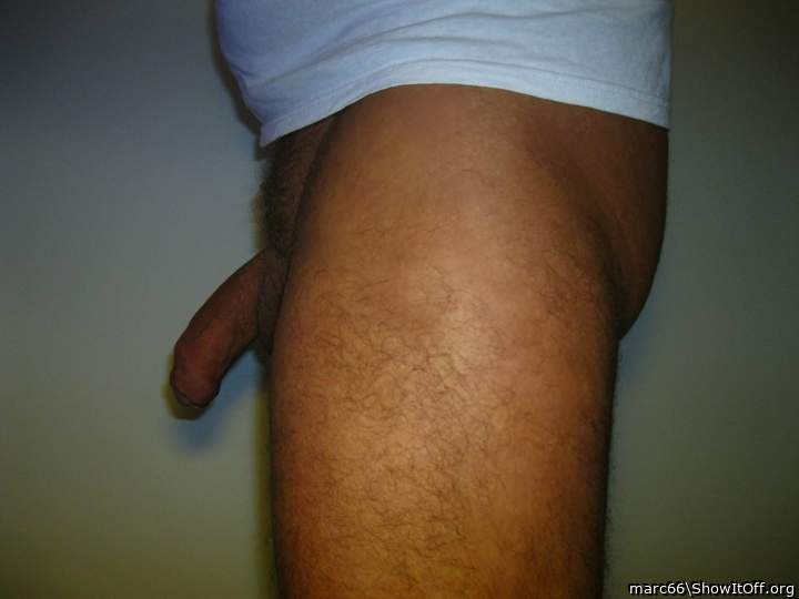 From the side in profile