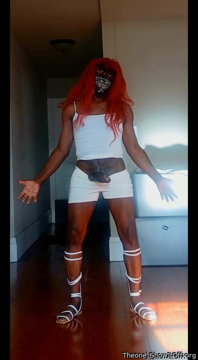 This Is How a Man in a Wig and sandals packing a BBC looks yall