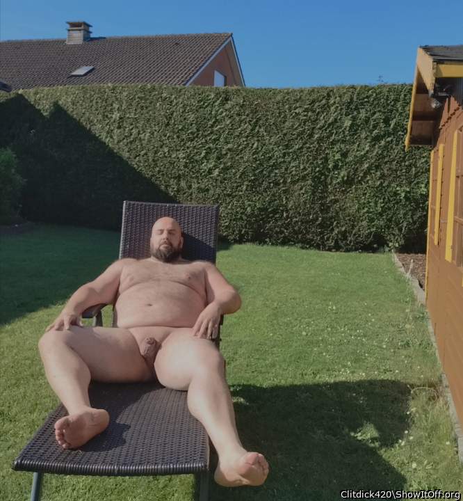 Naked sunbathing