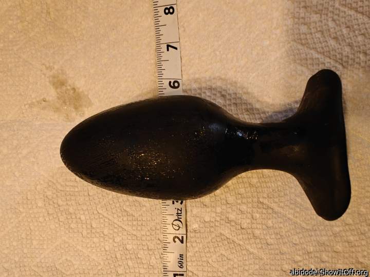 Plug with measuring tape