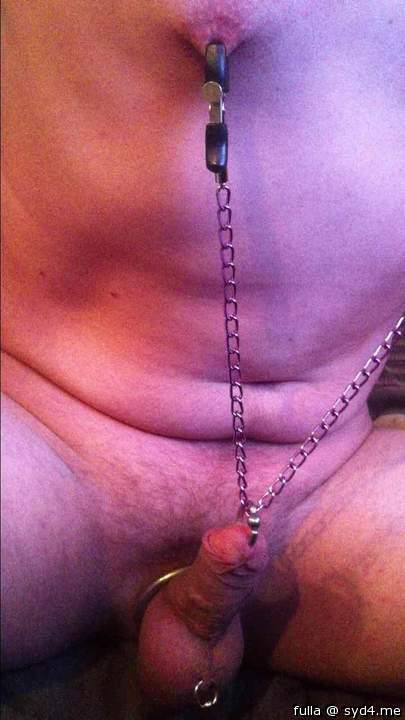 nipple clamps chained to pierced knob