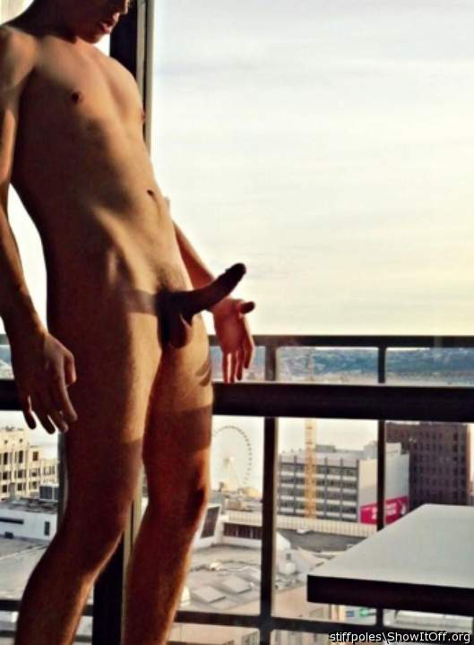 Me standing naked in hotel room window
