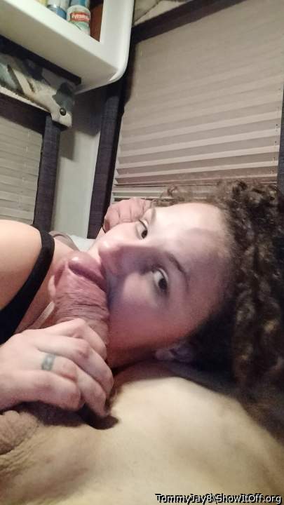 Wow, she looks good. Sucking that fat cock. Id love to whip