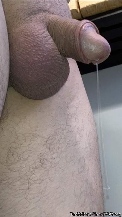 Long drop of precum from my soft cock