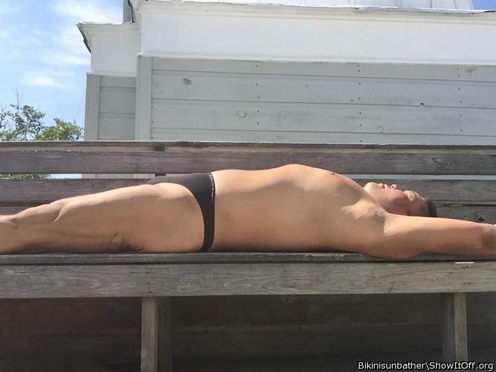 sunbathing black thong