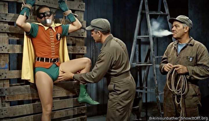 Robin tied up on crates