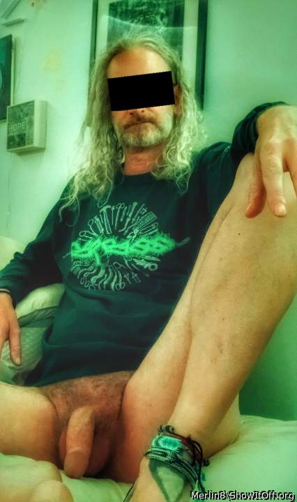 Metal dude waiting for metal chick to hang with.